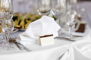 Place card on the white festive table