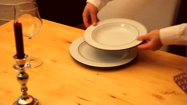 Waiter setting the table