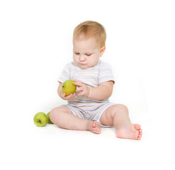 Fototapeta premium cute toddler with apples over white