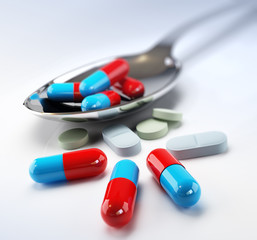 pills in spoon