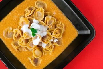 Tortellini with Pork Ragù in Milk & Carrots