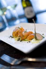 Smoked salmon with caperberries