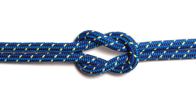 Reef knot made of two blue-yellow hawsers