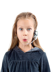 shocked little girl with headset.