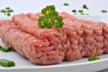 minced meat with parsley on a plate