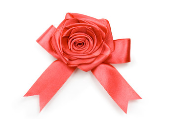 Beautiful red bow and rose on white background
