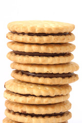 Stack of shortbread butter biscuits with chocolate filling