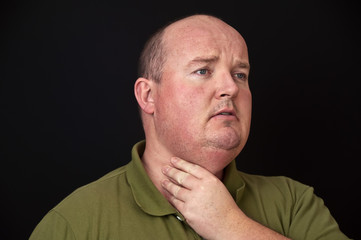 Obraz premium overweight male with a sore throat