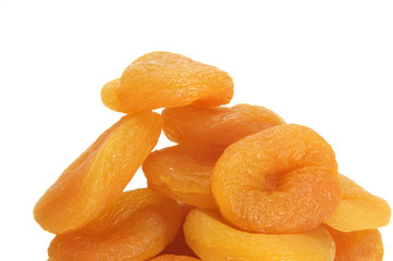 a dried peaches on a white background