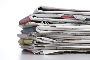 pile of newspaper with white background