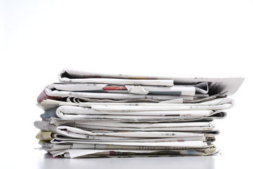 pile of newspaper with white background