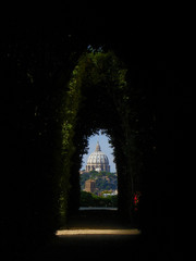 Fototapeta premium St Peters through the Gate on Aventino Hill in Rome