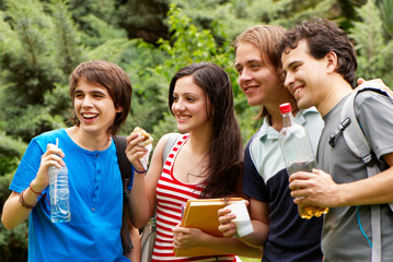Group of students during a lunch break in park