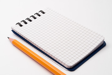 notebook with pencil