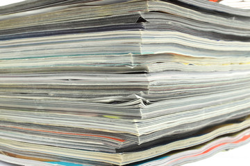 Corner of stack of old magazines for recycling