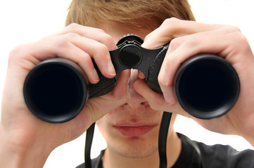 Man searching with binoculars - obrazy, fototapety, plakaty