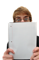 Student with glasses holding blank empty notebook