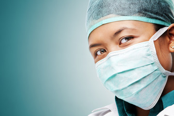 Female medical worker gazing to camera