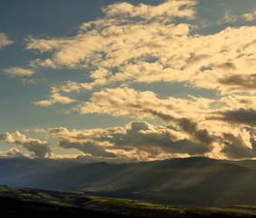 soleil derrière les nuages