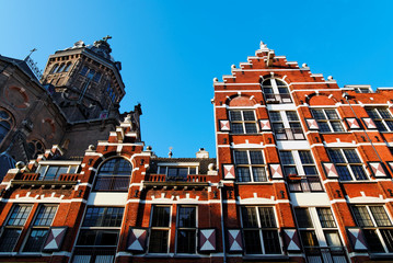 Saint Nicholas Church and Red Facade Amsterdam