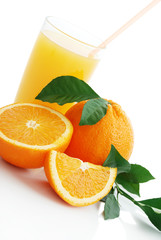 Orange with orange juice and the cut slices
