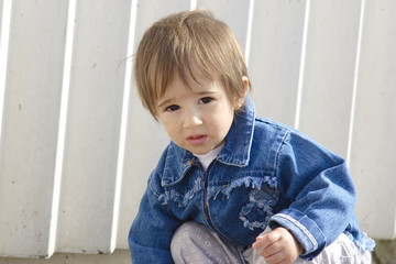 Fototapeta premium Baby girl playing