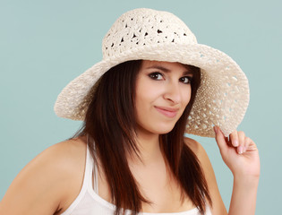 woman wearing white hat