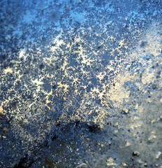 Frosty natural pattern on winter window