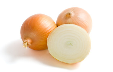 three heads of yellow onion