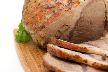 roast in the spices close up on a cutting board