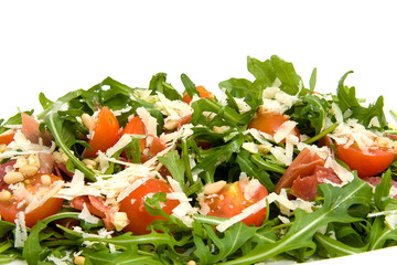 Fresh lettuce with tomatoes over white background