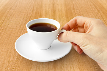 Coffee cup with a hand