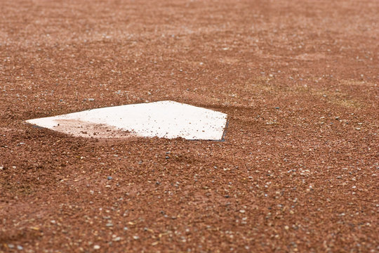 Closeup of home plate at baseball diamond