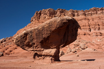 A balanced rock below the Vermillion Cliffs