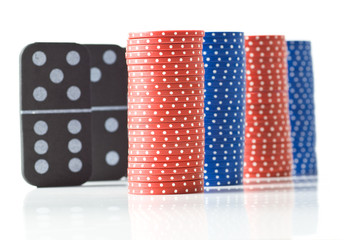 Stacks of poker chips and dominoes