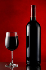 Bottle and glass of red wine