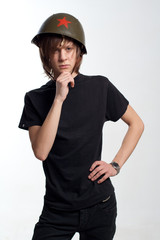 Young man in military helmet with star