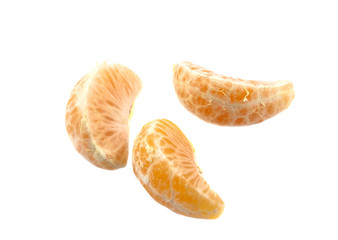 Naklejka na ściany i meble Three parts of tangerine