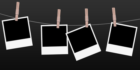 4 polaroids hanging on a rope
