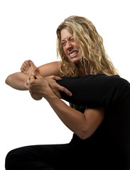 Woman stretches too hard and hurts herself