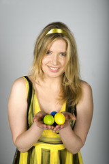 Young sexy woman with lots of easter coloured eggs  concept