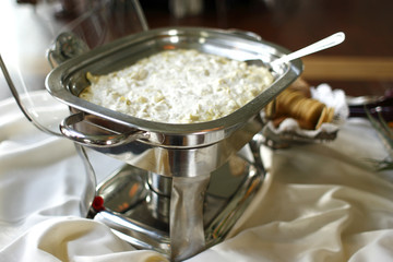 A tray of artichoke spread.