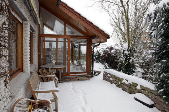 Wintergarten mit Zugang zur Terasse