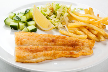 Fried fish fillet with vegetables