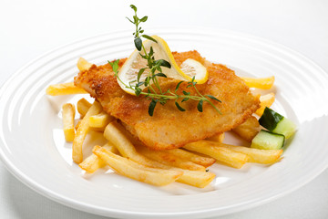 Fried fish fillet with vegetables