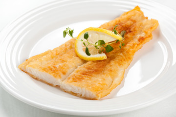 Fried fish fillet with vegetables