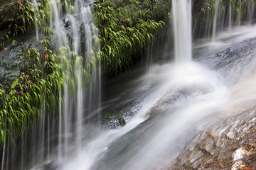 Fototapeta premium Beautiful small creek and waterfall inChangMai, Thailand