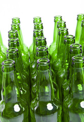 empty glass bottles on white background