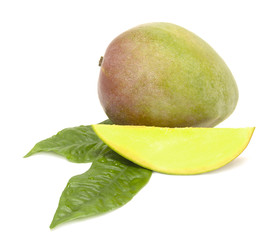 mango fruit with cut and green leaves