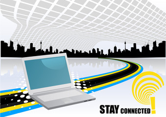 laptop on a abstract city background
